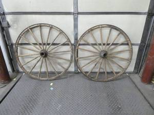 2 large wooden wheels