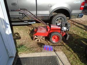Huskee rear tine roto tiller engine. 1 year old. Tested & works. As shown.
