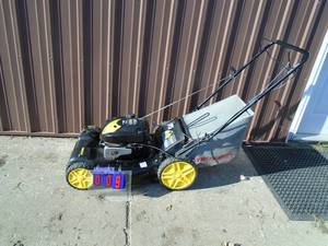 Brute 7.25 hp self propelled mower with bag. Used condition. Tested & works. As shown.