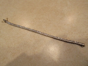 STERLING AND CUBIC ZIRCONIUM TENNIS BRACELET