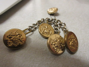 WORLDS FAIR BRACELET, JAMES LIND BELT BUCKE AND MILITARY OR BLAZER BUTTONS