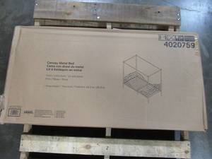 lot 332 image: DHP Pink Canopy Bed Frame Model 4020759