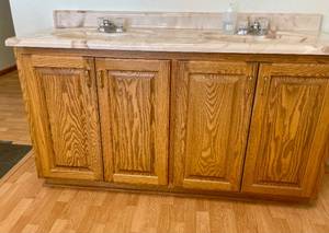 lot 46 image: Oak Bathroom Vanity with Double Sink and Faucets
