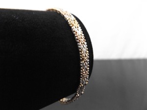 lot 28 image: .925 Sterling Silver Duotone Woven Link Bracelet