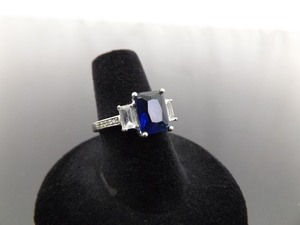 lot 32 image: .925 Sterling Silver Square Cut Sapphire Crystal Ring Size 7