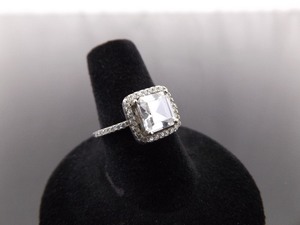 lot 57 image: .925 Sterling Silver Square Cut Zirconia Ring Size 7