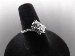 lot 61 image: .925 Sterling Silver Faceted Zirconia Ring Size 8
