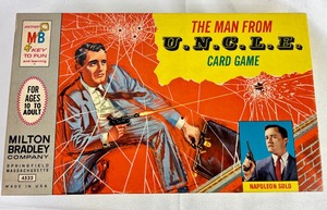 lot 201 image: Vintage Games -  The Man From U.N.C.L.E. Card Game, Scrabble Jr., & Monopoly