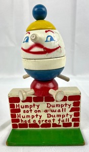 lot 210 image: Vintage Childrens Toys, Holgate Toys Humpty Dumpty, Wes-Ko Products Piggy Bank, and Hand Toy