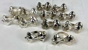 lot 222 image: Lovely Grouping of Vintage Silver Plate Items- S&P Shakers, Candle Holders, Napkin Rings