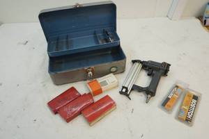 vintage tackle box, air nailer, brads
