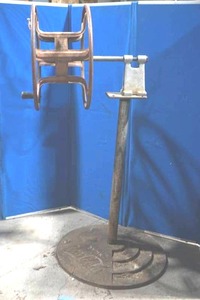 hose reel on Vintage Coke Cola stand