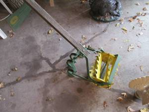 lot 16 image: Antique Cultivator with wood handle...