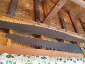 lot 24 image: 2 Vintage Hand saws...one is 68 on...
