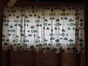 lot 25 image: 2 pairs of John Deere curtains pict...