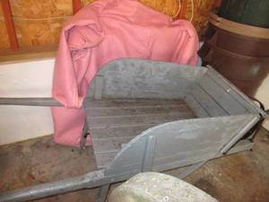 lot 31 image: Vintage wood wheelbarrow with wood ...