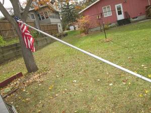 lot 37 image: US flag on 16 foot pole...top is cr...