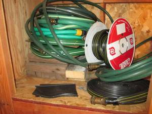 lot 70 image: Lot of Garden hoses and wood blocks...