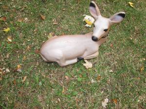 lot 85 image: Plastic deer ornament weighted with...