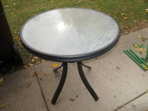 lot 90 image: Metal base glass top patio table 28...