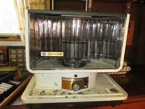 lot 118 image: Kerosene heater...
