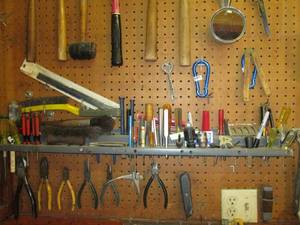 lot 133 image: Tools galore Hammers levels square...