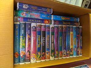 lot 353 image: Box full of Disney VHS tapes (see p...