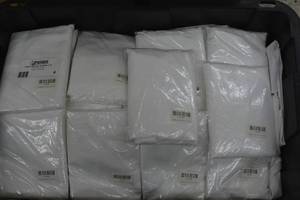 Large box of white folding chair covers