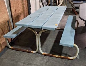 Weathered picnic table with Metal f...