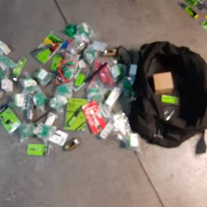 Work bag filled with Greenlee elect...
