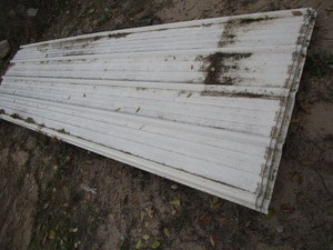 lot 6 image: Pole barn sheet tin, 10ft long, fou...