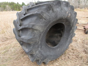 lot 16 image: Field & Road tire off Big Iron...