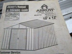 lot 2 image: New, unassembled metal storage shed...
