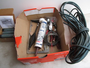 lot 65 image: Mighty Putty, electrical cord, clin...