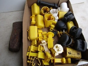 lot 64 image: Fence insulators with T-post caps, ...