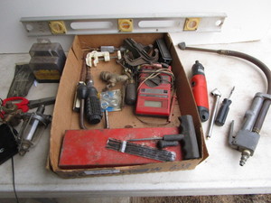 lot 63 image: Tools with level, tire repair, air ...