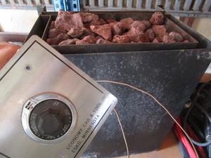 lot 118 image: Sauna stove with water reservoir...