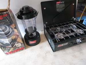 lot 131 image: Coleman dual fuel stove, lantern...