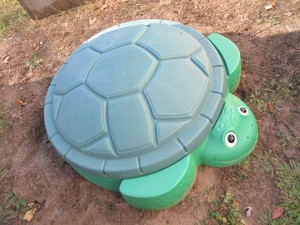 lot 147 image: Turtle sandbox...