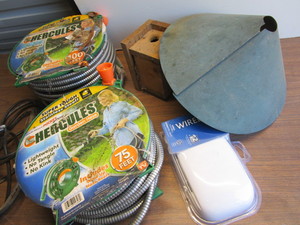 lot 162 image: Stainless hose - 100ft and 75ft, do...