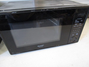 lot 207 image: Sharp microwave, R-309YK...