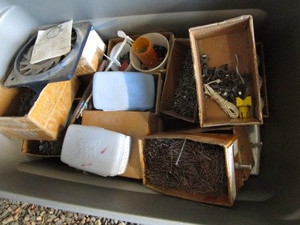 lot 231 image: Tote of hardware...