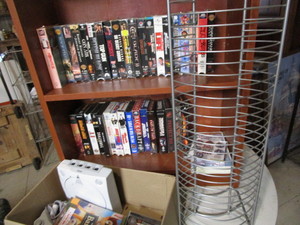 lot 250 image: Daewood VCR player, VHS tapes, book...