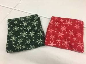 lot 91 image: Brand New Set of TWO 60x48 Soft Fleece Red & Green Snowflake Throws