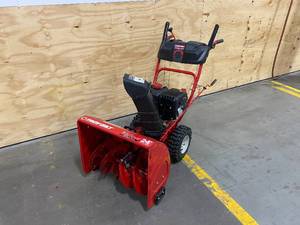 lot 2A image: TROY-BILT 24 in. 208 cc Two-Stage Gas Snow Blower with Electric Start Self Propelled
