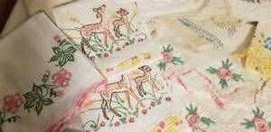 lot 110 image: Charming Collection of Vintage Embroidered Linen Pillowcases
