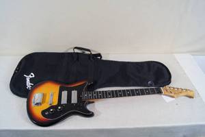 lot 1 image: Vintage Harmony Electric Guitar with Fender Gig Bag