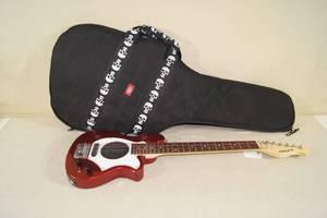 lot 3 image: Aria Travel Electric Guitar with Built in Amp and Speaker