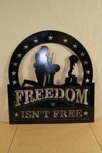 lot 13 image: Freedom Isnt Free Laser Cut Metal Decorative Sign