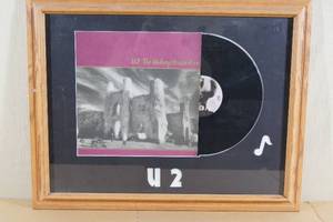 lot 50 image: Framed U2 The Unforgettable Fire Record Album